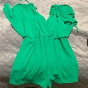Green romper great for spring or st Patrick’s day